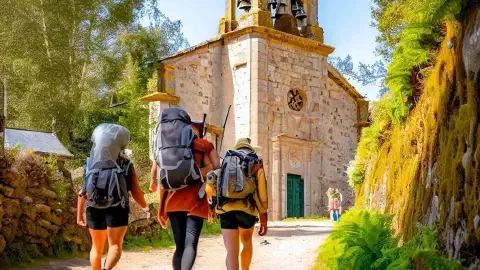 Hikers Approaching The Church Of San Salvador Sarria On The Camino Francés Spain Hikers approaching The Town of Sarria, on the Camino Francés, Spain