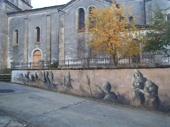 Strange mural on the church at Sarria on the Camino Francés