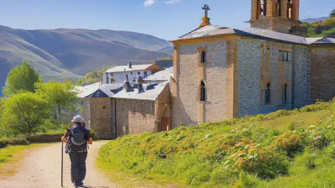 Convent Of The Annunciation Villafranca Del Bierzo Spain A hiker standing near The Convent of the Annunciation, Villafranca del Bierzo, Spain, on a sunny day